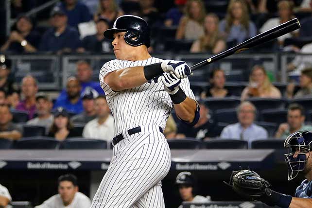 Aaron Judge's parents, Patty and Wayne, celebrate his 62nd home run