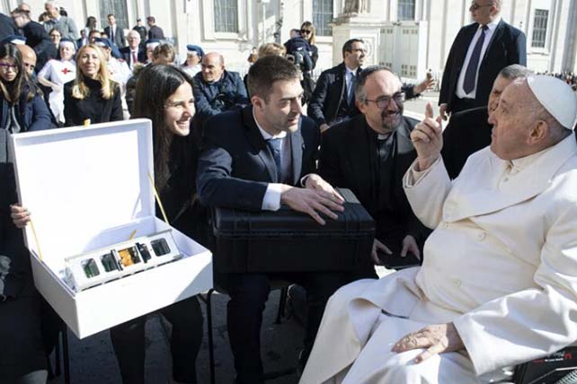 Pope Francis discusses the space mission before blessing the Spei Satelles on March 29, 2023, at the Vatican. Photo © Vatican Media