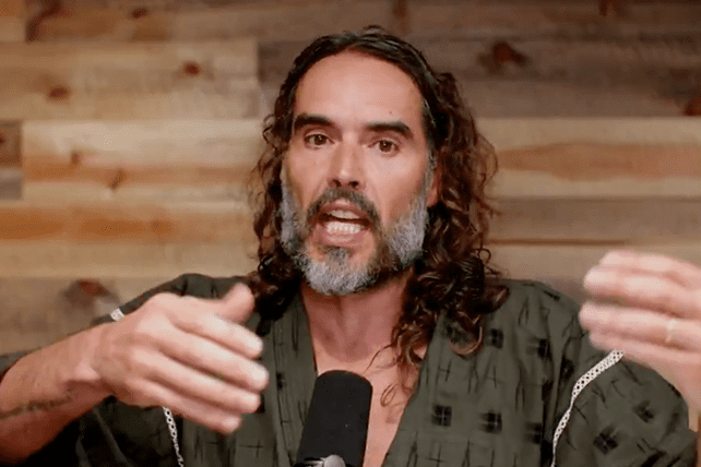 Russell Brand charged